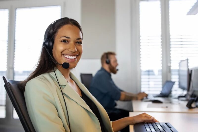 Support specialists at their workstations